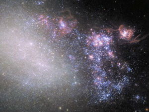 Галаксија у којој блеште нове звезде рођене у блиском сусрету
