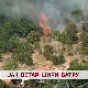 Јак ветар шири ватру