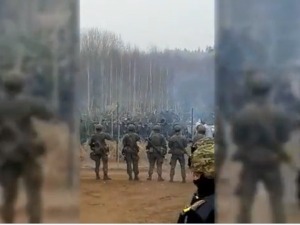 Снимак са пољске границе, чује се упозорење мигрантима