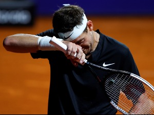 Сузе и емотивни опроштај Дел Потра од тениса