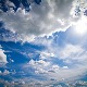Топло и понегде пљускови, после подне разведравање