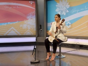 Дама са гуслама, РТС Свет, 20.56