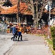 Облачно, понегде слаба киша, провејавање снега на планинама